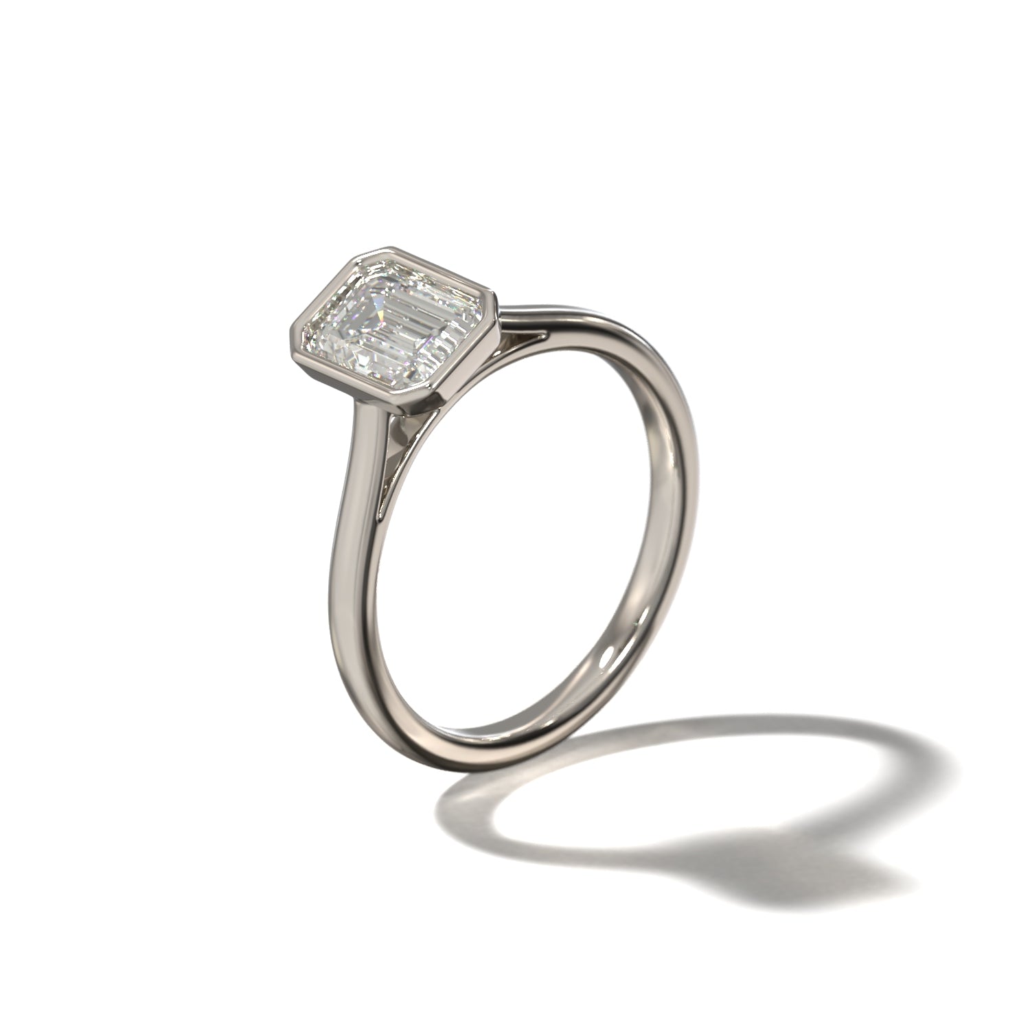 EMERALD BEZEL SOLITAIRE