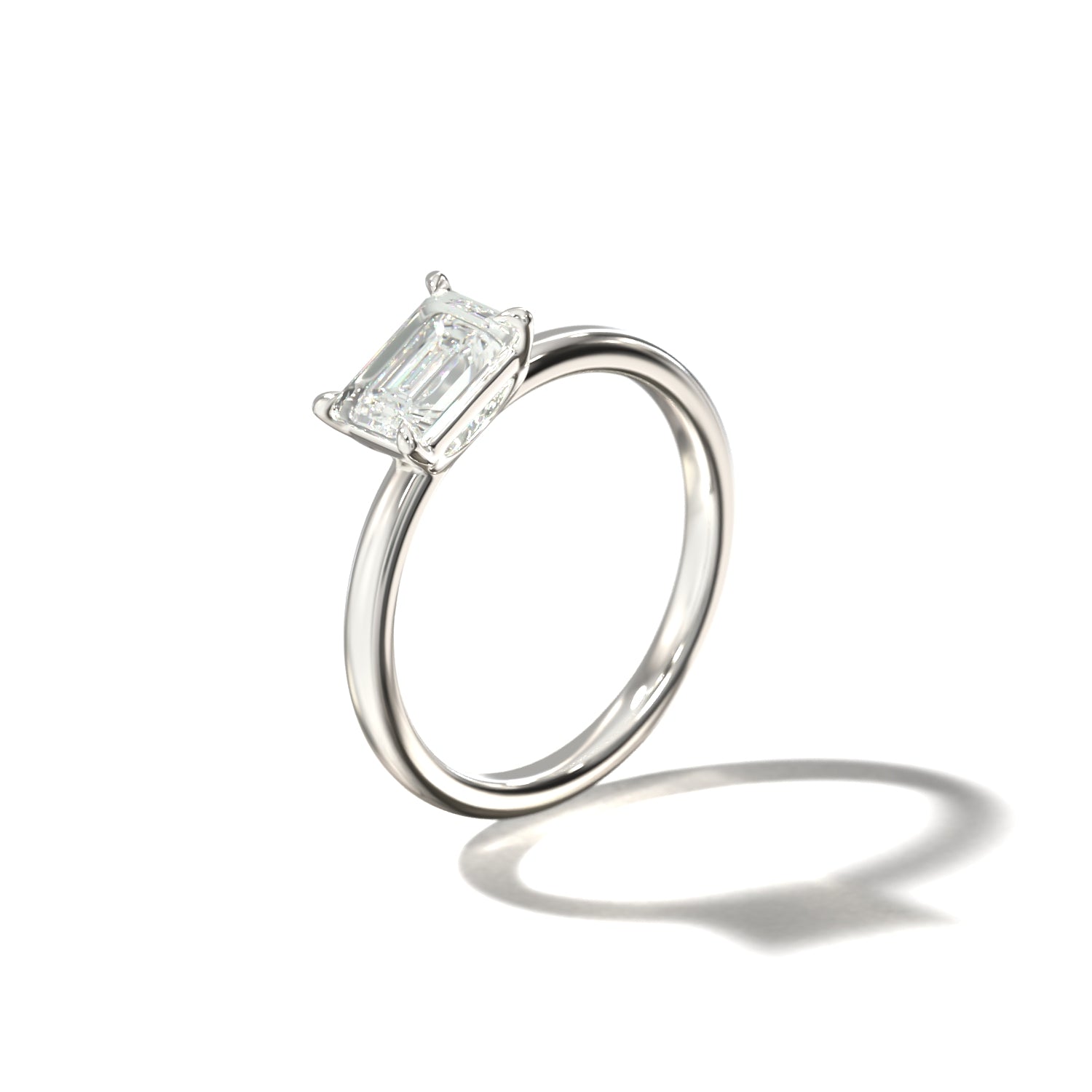 EMERALD EAST WEST SOLITAIRE