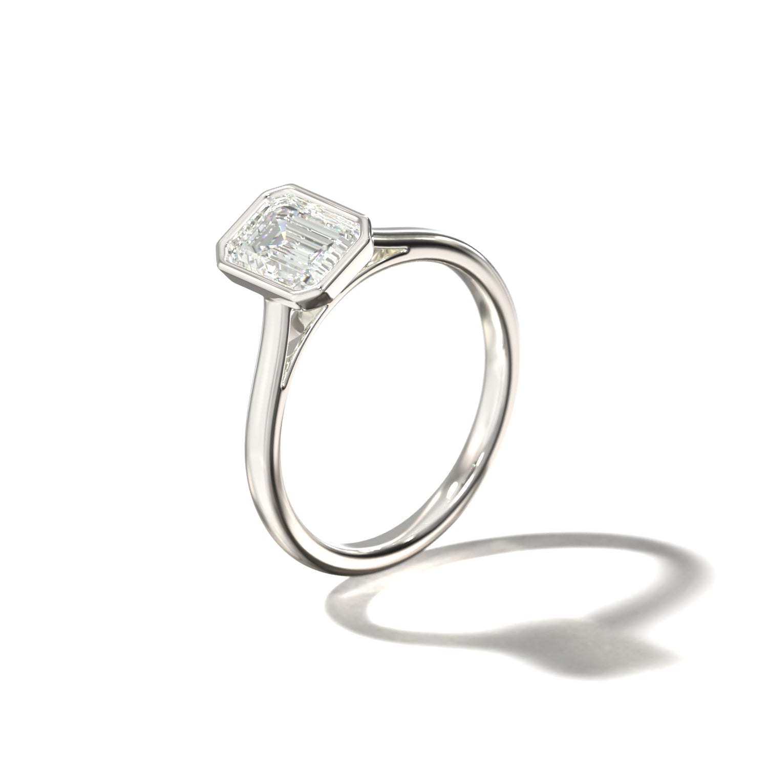 EMERALD BEZEL SOLITAIRE