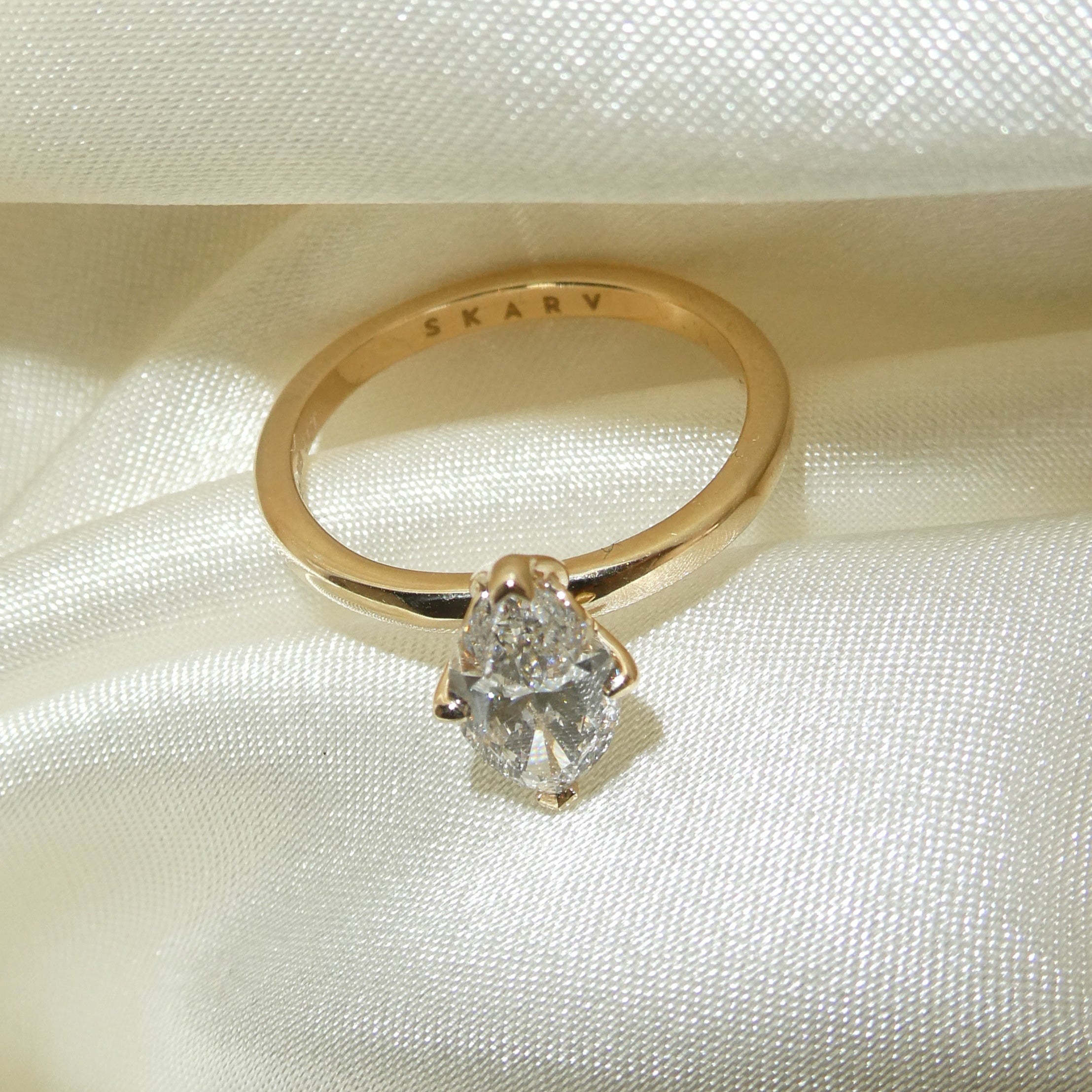 MARQUISE TULIP NORTH SOUTH SOLITAIRE