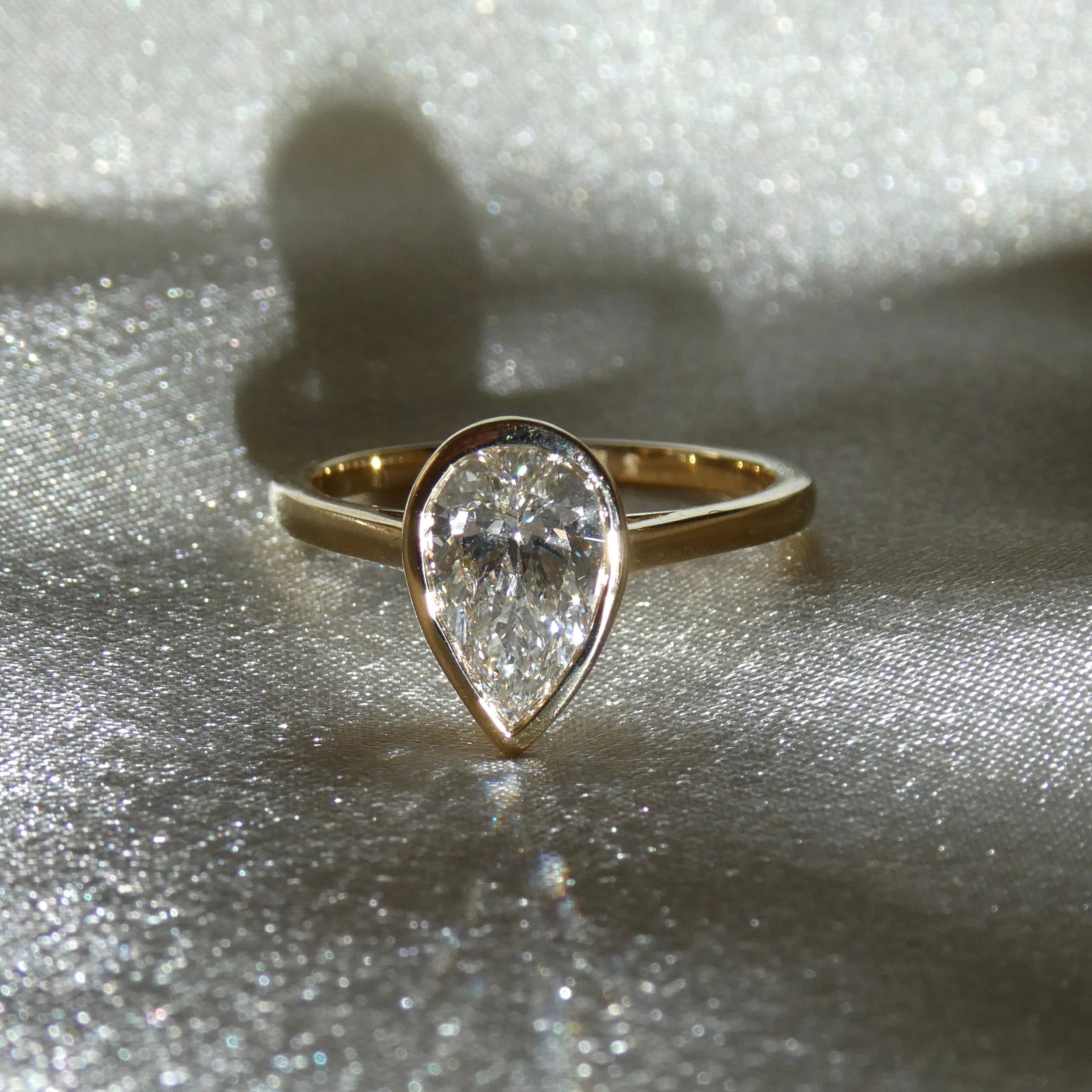 PEAR BEZEL SOLITAIRE