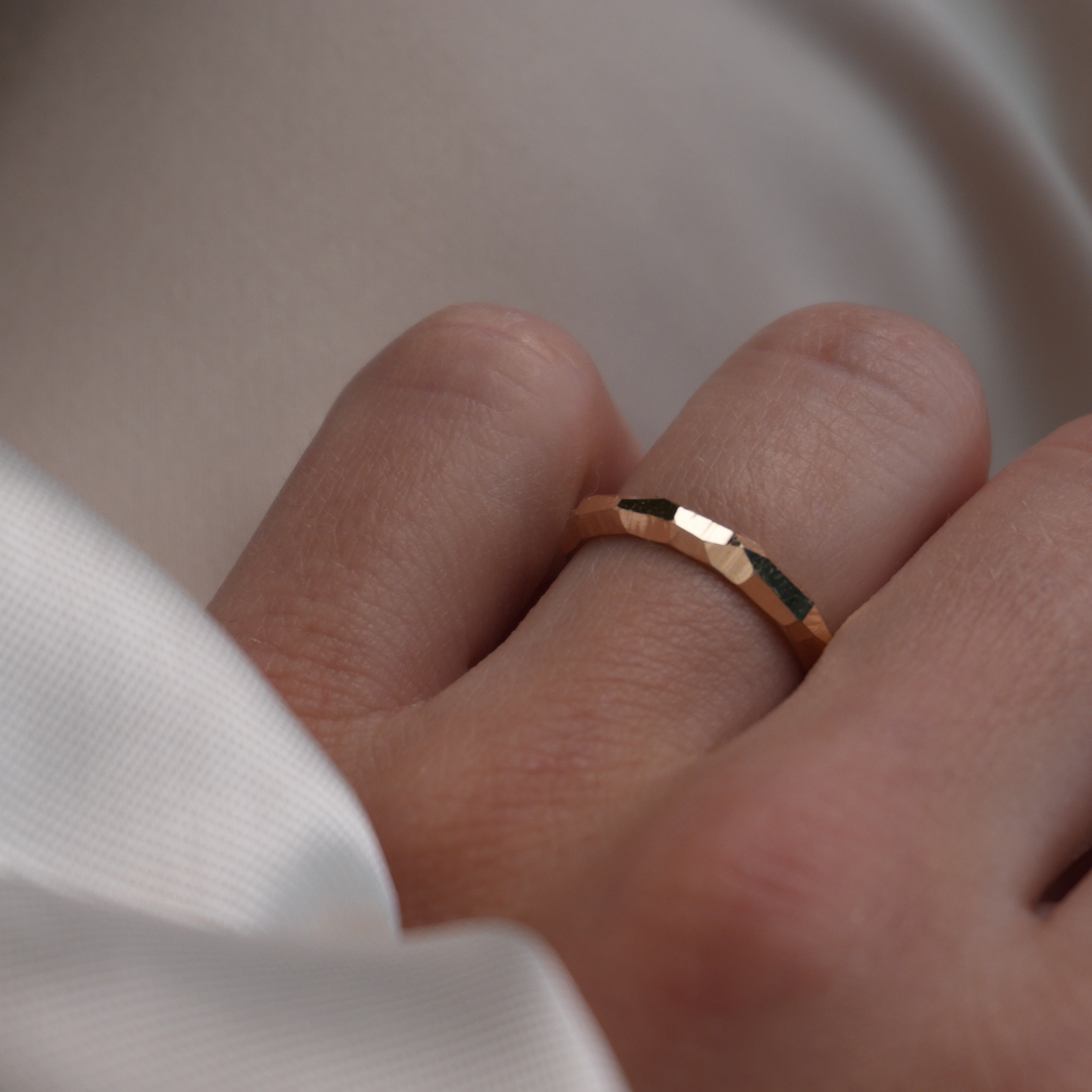 HER FACETED WEDDING BAND