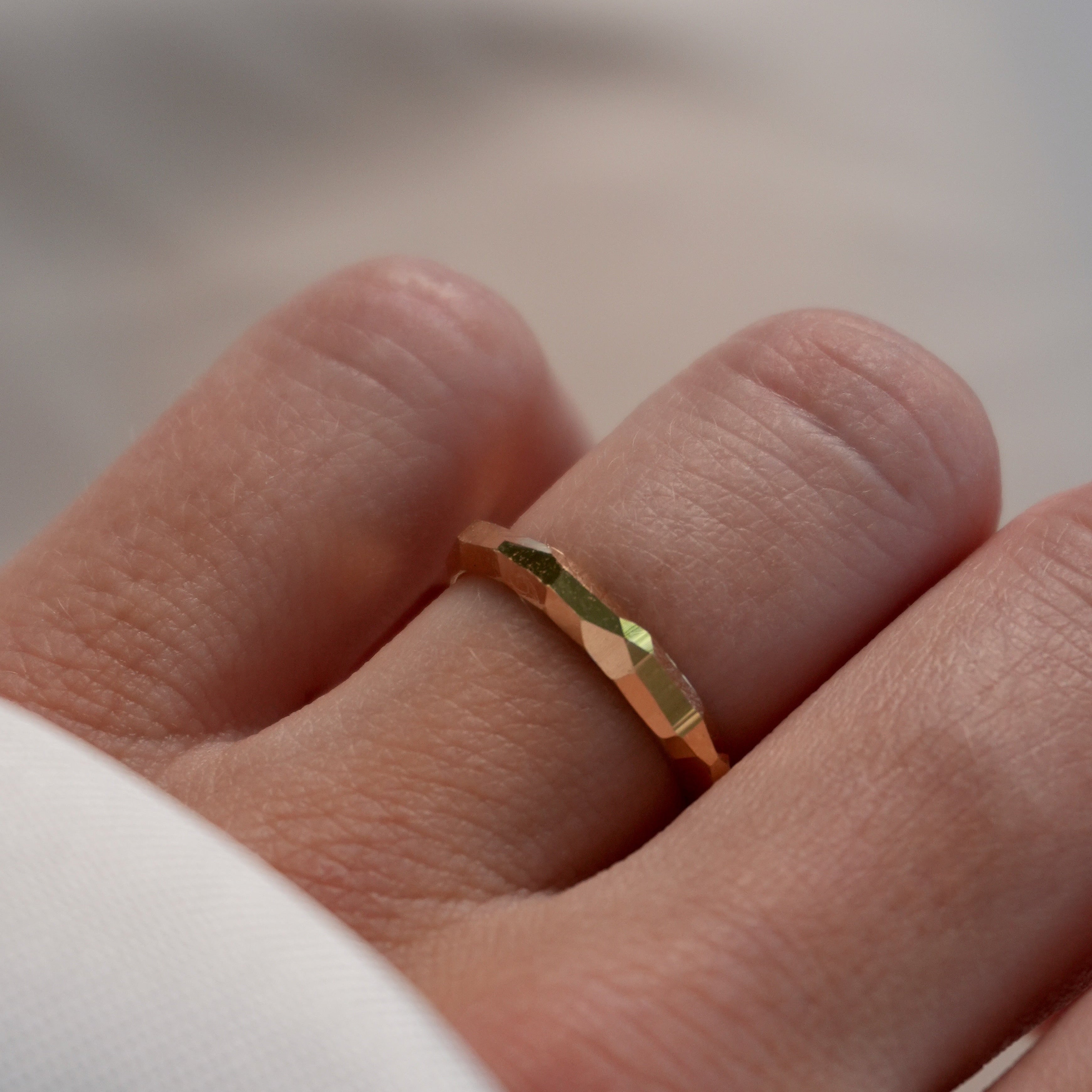 HER FACETED WEDDING BAND